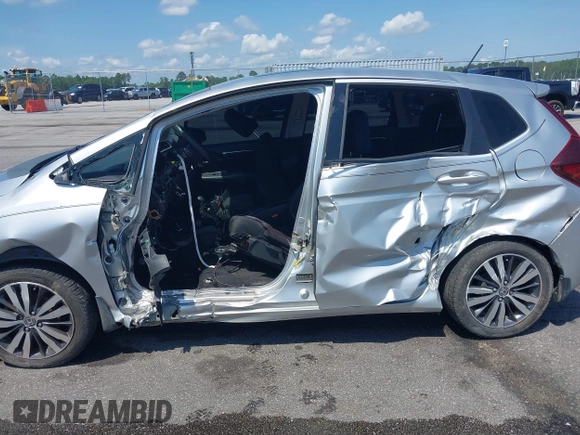 2015 Honda Fit EX-L z VIN 3HGGK5H82FM727678, wystawiony jako IAAI lot #42451860 z przebiegiem 102 512 mil mil oraz . Historia ofert i sprzedaży dostępna na DreamBid. Obrazek 6.