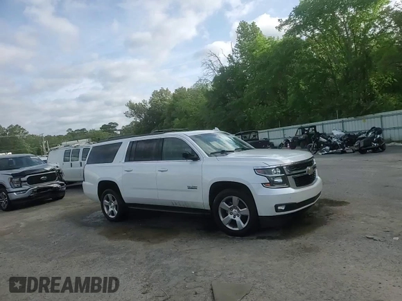 2017 Chevrolet Suburban LT z VIN 1GNSCHKC8HR330084, wystawiony jako Copart lot #52335325 z przebiegiem Nie podano mil oraz Szkoda całkowita • Salvage title. Historia ofert i sprzedaży dostępna na DreamBid. Obrazek 14.