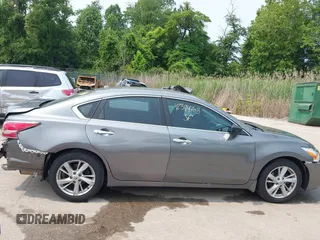 2015 Nissan Altima S z VIN 1N4AL3AP7FC217910, wystawiony jako IAAI lot #42394703 z przebiegiem 100 411 mil mil oraz . Historia ofert i sprzedaży dostępna na DreamBid. Obrazek 13.