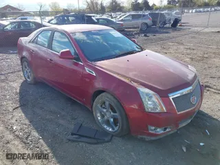 2008 Cadillac CTS RWD w/1SB with VIN 1G6DR57V580212574, listed as a IAAI auction lot 42010537 with 122,390 mi miles. Bid and sale history available at carsss.com. Image 1.