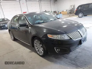 2012 Lincoln MKS EcoBoost with VIN 1LNHL9FT3CG801433, listed as a IAAI auction lot 41231850 with 108,597 mi miles and . Bid and sale history available at DreamBid. Image 1.