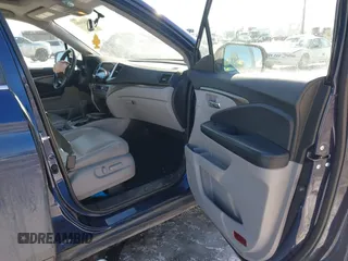 2018 Honda Pilot EX-L with VIN 5FNYF6H50JB026024, listed as a IAAI auction lot 41424404 with 56,030 mi miles. Bid and sale history available at carsss.com. Image 5.