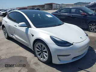 2022 Tesla Model 3 Long Range z VIN 5YJ3E1EB8NF290933, wystawiony jako IAAI lot #41999569 z przebiegiem 58 317 mil mil oraz . Historia ofert i sprzedaży dostępna na DreamBid. Obrazek 1.