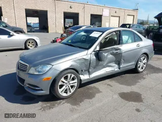 2014 Mercedes-Benz C-Class C 250 Sport with VIN WDDGF4HB1EA956833, listed as a IAAI auction lot 41648289 with 128,082 mi miles. Bid and sale history available at carsss.com. Image 2.