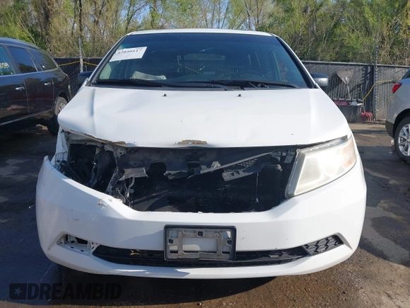 2012 Honda Odyssey EX-L with VIN 5FNRL5H62CB010054, listed as a IAAI auction lot 42040117 with 189,566 mi miles and . Bid and sale history available at carsss.com. Image 6.
