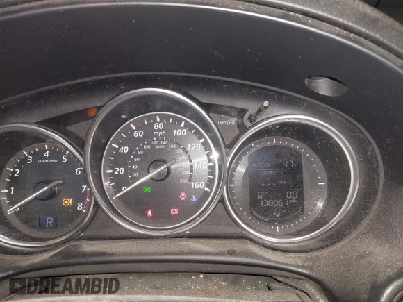 2015 Mazda CX-5 Touring with VIN JM3KE2CY2F0458114, listed as a IAAI auction lot 41545493 with 138,061 mi miles. Bid and sale history available at carsss.com. Image 7.