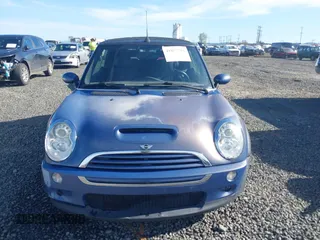 2005 MINI Convertible S with VIN WMWRH33455TF82408, listed as a IAAI auction lot 41857791 with 133,824 mi miles and . Bid and sale history available at DreamBid. Image 12.