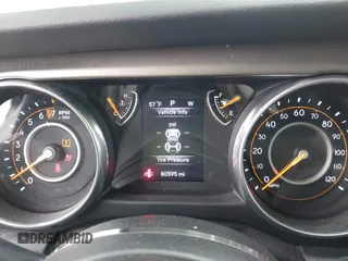 2018 Jeep Wrangler Unlimited Sport S z VIN 1C4HJXDG6JW222637, wystawiony jako IAAI lot #42333283 z przebiegiem 80 595 mil mil oraz . Historia ofert i sprzedaży dostępna na DreamBid. Obrazek 7.