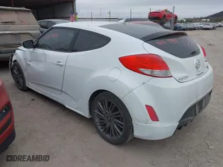 2013 Hyundai Veloster RE:MIX with VIN KMHTC6AD6DU135325, listed as a IAAI auction lot 41089948 with 238,459 mi miles. Bid and sale history available at carsss.com. Image 3.