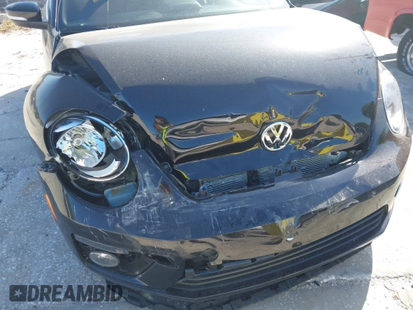 2015 Volkswagen Beetle with VIN 3VW5A7AT7FM811978, listed as a IAAI auction lot 41983986 with 84,421 mi miles and . Bid and sale history available at DreamBid. Image 6.