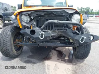 2013 Jeep Wrangler Sport z VIN 1C4AJWAG2DL538526, wystawiony jako IAAI lot #42378501 z przebiegiem 81 709 mil mil oraz . Historia ofert i sprzedaży dostępna na DreamBid. Obrazek 6.