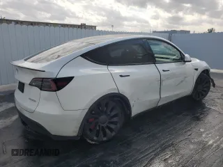 2023 Tesla Model Y Performance with VIN 7SAYGDEF8PF595178, listed as a Copart auction lot 46496995 with 39,057 mi miles and Non Repairable. Bid and sale history available at DreamBid. Image 3.