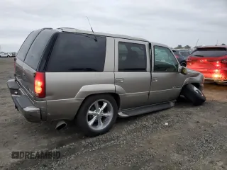 2000 Cadillac Escalade z VIN 1GYEK63R5YR219759, wystawiony jako Copart lot #86373734 z przebiegiem 190 307 mil mil oraz Szkoda całkowita • Salvage title. Historia ofert i sprzedaży dostępna na DreamBid. Obrazek 3.