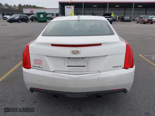 2015 Cadillac ATS Coupe Standard AWD with VIN 1G6AG1RX0F0127073, listed as a IAAI auction lot 41296448 with 119,718 mi miles. Bid and sale history available at carsss.com. Image 16.