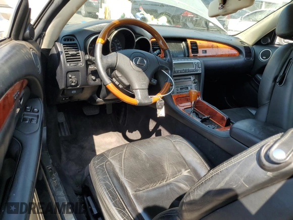 2002 Lexus SC 430 with VIN JTHFN48Y720029932, listed as a Copart auction lot 69795974 with 146,548 mi miles and Salvage Title. Bid and sale history available at DreamBid. Image 8.