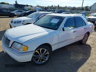 1997 Mercedes-Benz C 230/260/280/320 z VIN WDBHA28E5VF607705, wystawiony jako IAAI lot #41208049 z przebiegiem Nie podano mil oraz . Historia ofert i sprzedaży dostępna na DreamBid. Obrazek 2.