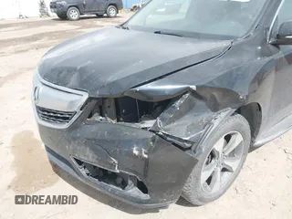 2014 Acura MDX with VIN 5FRYD4H21EB013027, listed as a IAAI auction lot 42040156 with 146,763 mi miles and . Bid and sale history available at DreamBid. Image 6.
