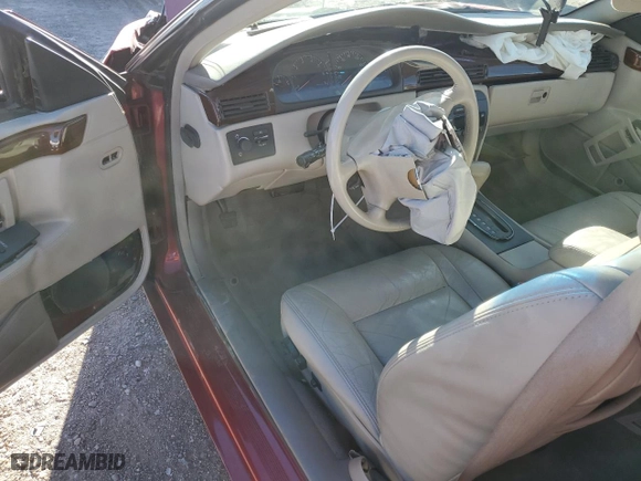 2000 Cadillac Eldorado with VIN 1G6EL12Y2YU147272, listed as a Copart auction lot 84150944 with 0 mi miles and Salvage Title. Bid and sale history available at carsss.com. Image 8.