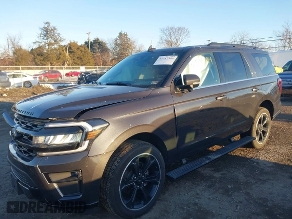 2023 Ford Expedition Limited with VIN 1FMJU2A89PEA48856, listed as a IAAI auction lot 41287594 with 13,891 mi miles. Bid and sale history available at carsss.com. Image 2.