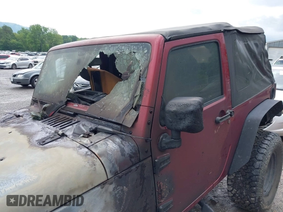 2012 Jeep Wrangler Sport with VIN 1C4AJWAG9CL203018, listed as a IAAI auction lot 42377899 with Not provided miles and . Bid and sale history available at DreamBid. Image 15.