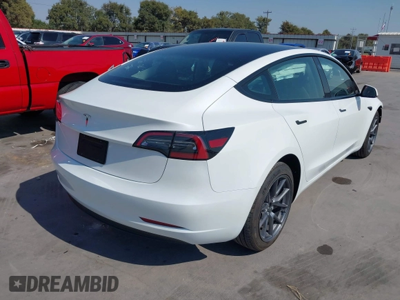 2023 Tesla Model 3 with VIN 5YJ3E1EA9PF585632, listed as a IAAI auction lot 40520993 with 7,775 mi miles and . Bid and sale history available at DreamBid. Image 4.