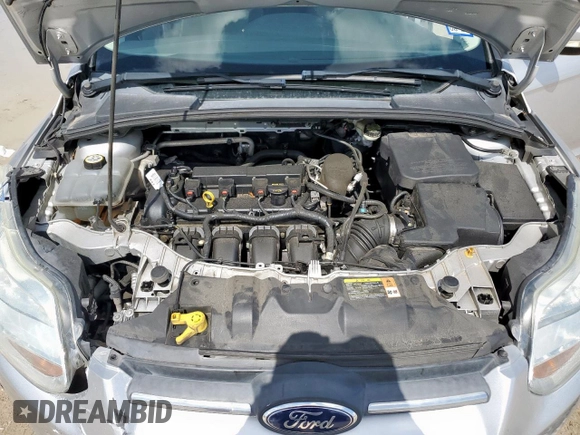 2013 Ford Focus SE with VIN 1FADP3F22DL263124, listed as a Copart auction lot 61583795 with 133,522 mi miles and Salvage title. Bid and sale history available at DreamBid. Image 11.