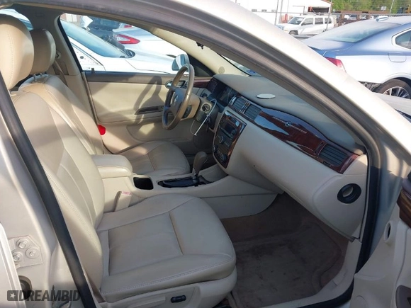2008 Chevrolet Impala LT with VIN 2G1WT58KX89251249, listed as a IAAI auction lot 42032934 with 171,580 mi miles. Bid and sale history available at carsss.com. Image 5.