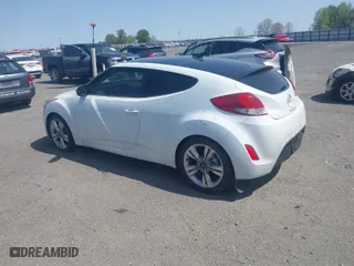 2016 Hyundai Veloster with VIN KMHTC6AD9GU272411, listed as a IAAI auction lot 41904711 with 133,490 mi miles. Bid and sale history available at carsss.com. Image 3.