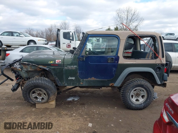 1997 Jeep Wrangler SE with VIN 1J4FY29PXVP406939, listed as a IAAI auction lot 41612380 with 248,314 mi miles. Bid and sale history available at carsss.com. Image 14.