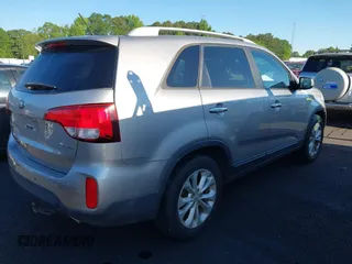 2015 Kia Sorento EX with VIN 5XYKU4A79FG628142, listed as a IAAI auction lot 42190773 with 153,707 mi miles. Bid and sale history available at carsss.com. Image 4.
