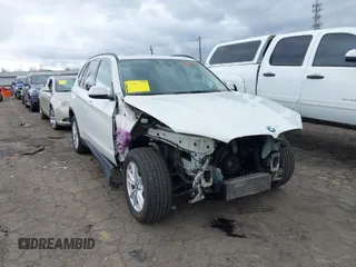 2015 BMW X5 sDrive35i with VIN 5UXKR2C54F0H34975, listed as a IAAI auction lot 41704467 with 92,006 mi miles. Bid and sale history available at carsss.com. Image 1.