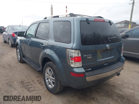 2010 Mercury Mariner Premier with VIN 4M2CN9H75AKJ06979, listed as a IAAI auction lot 41156374 with 149,784 mi miles and . Bid and sale history available at DreamBid. Image 3.