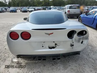 2012 Chevrolet Corvette 3LT с VIN 1G1YG2DW0C5100057, выставлен на аукционе Copart как лот 74807624 с пробегом 52 560 миль миль и Списание • Salvage title. История ставок и продаж доступна на DreamBid. Изображение 6.