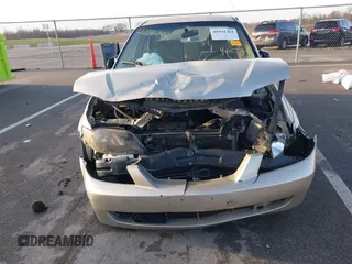2003 Mazda Protege DX with VIN JM1BJ225X31160766, listed as a IAAI auction lot 41941361 with 190,125 mi miles and . Bid and sale history available at DreamBid. Image 6.