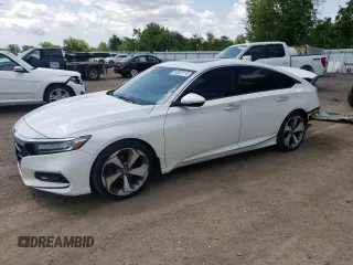 2018 Honda Accord Touring z VIN 1HGCV1F92JA807370, wystawiony jako Copart lot #60023115 z przebiegiem 177 299 mil mil oraz Szkoda całkowita • Salvage title. Historia ofert i sprzedaży dostępna na DreamBid. Obrazek 1.
