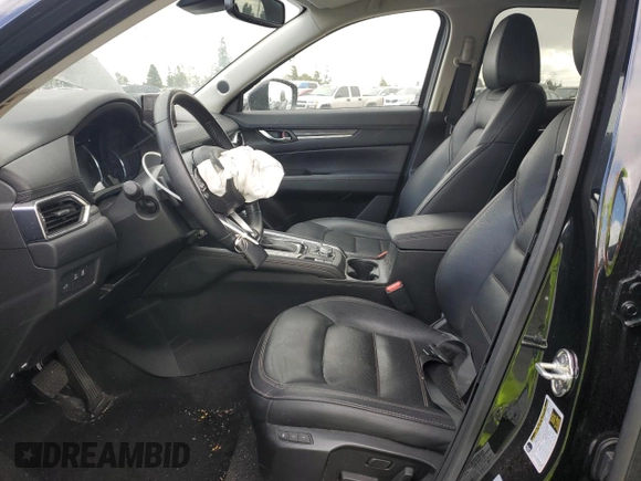 2020 Mazda CX-5 Grand Touring with VIN JM3KFADM3L0815055, listed as a Copart auction lot 48175245 with 56,602 mi miles and Salvage Title. Bid and sale history available at carsss.com. Image 7.