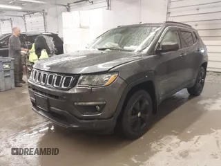 2018 Jeep Compass Altitude with VIN 3C4NJDBB6JT187581, listed as a IAAI auction lot 41542689 with 126,147 mi miles and . Bid and sale history available at carsss.com. Image 2.