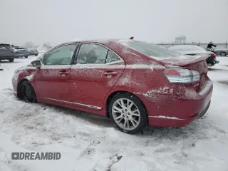 2010 Lexus HS 250h with VIN JTHBB1BA9A2005121, listed as a Copart auction lot 87825175 with 124,594 mi miles and Salvage Title. Bid and sale history available at DreamBid. Image 2.