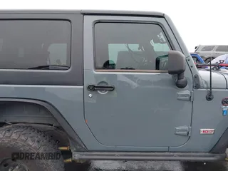 2013 Jeep Wrangler Rubicon 10th Anniversary with VIN 1C4BJWCG2DL651815, listed as a IAAI auction lot 41643919 with 98,297 mi miles and . Bid and sale history available at DreamBid. Image 13.