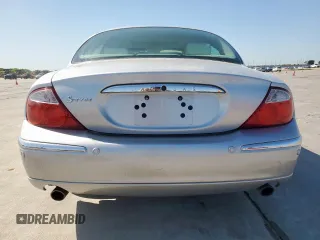 2003 Jaguar S-Type with VIN SAJEA01T43FM62477, listed as a Copart auction lot 52693085 with 109,761 mi miles and Salvage Title. Bid and sale history available at DreamBid. Image 6.