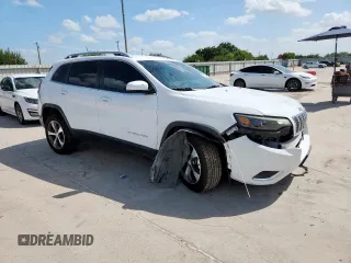 2019 Jeep Cherokee High Altitude z VIN 1C4PJMDX5KD165578, wystawiony jako Copart lot #63191955 z przebiegiem 107 313 mil mil oraz Szkoda całkowita • Salvage title. Historia ofert i sprzedaży dostępna na DreamBid. Obrazek 4.