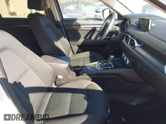 2019 Mazda CX-5 Sport with VIN JM3KFBBM0K0574255, listed as a IAAI auction lot 41661924 with 93,851 mi miles and . Bid and sale history available at DreamBid. Image 5.