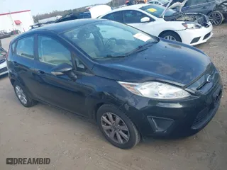 2013 Ford Fiesta SE with VIN 3FADP4EJ7DM140755, listed as a IAAI auction lot 41908366 with 68,744 mi miles. Bid and sale history available at carsss.com. Image 1.