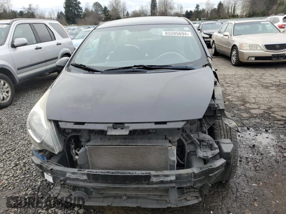 2013 Kia Rio LX with VIN KNADM4A30D6207753, listed as a Copart auction lot 85595694 with 63,062 mi miles and Salvage Title. Bid and sale history available at carsss.com. Image 5.