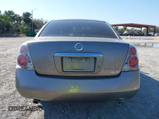 2005 Nissan Altima SE with VIN 1N4BL11E75C117733, listed as a IAAI auction lot 41516717 with 167,370 mi miles. Bid and sale history available at carsss.com. Image 17.