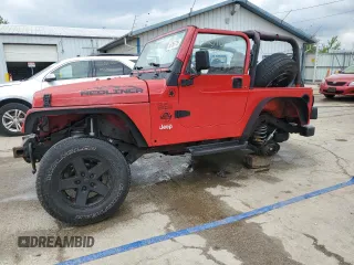 2000 Jeep Wrangler SE with VIN 1J4FA29P6YP793045, listed as a Copart auction lot 58756715 with 202,110 mi miles and Salvage title. Bid and sale history available at DreamBid. Image 1.