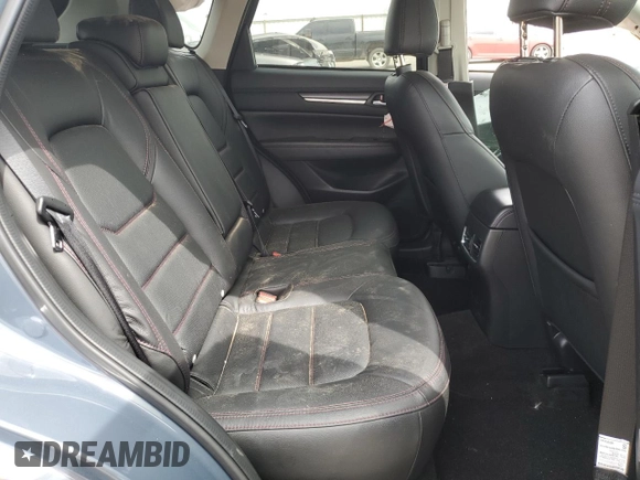 2024 Mazda CX-5 S Carbon Edition z VIN JM3KFBCL2R0521170, wystawiony jako Copart lot #53203485 z przebiegiem Nie podano mil oraz Nie do naprawy. Historia ofert i sprzedaży dostępna na DreamBid. Obrazek 11.