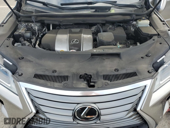 2017 Lexus RX 350 with VIN 2T2BZMCA2HC114007, listed as a Copart auction lot 63587985 with 61,421 mi miles and Salvage title. Bid and sale history available at DreamBid. Image 12.