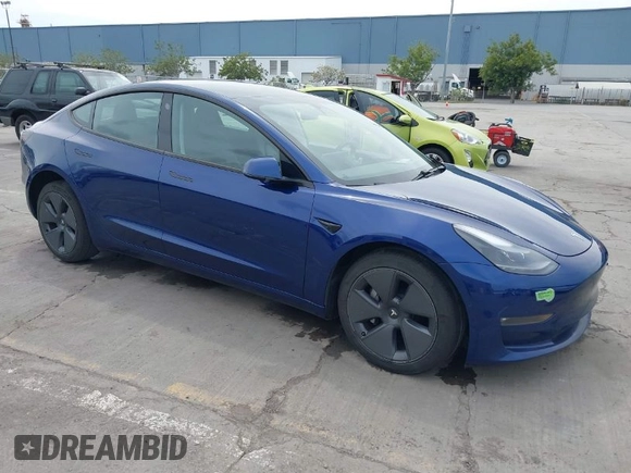 2021 Tesla Model 3 Long Range with VIN 5YJ3E1EB6MF878411, listed as a IAAI auction lot 41986947 with 71,978 mi miles and . Bid and sale history available at DreamBid. Image 1.