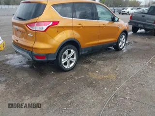 2016 Ford Escape SE with VIN 1FMCU0GX3GUB75572, listed as a IAAI auction lot 41869920 with 154,586 mi miles and . Bid and sale history available at carsss.com. Image 4.